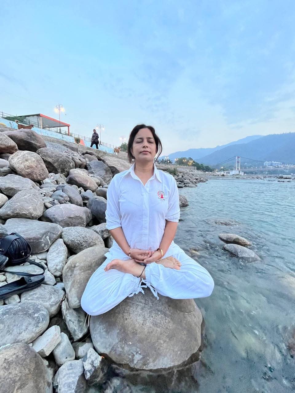 Instructor guiding a yoga class